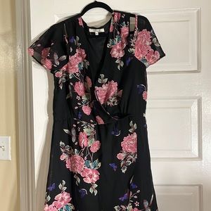 Cold shoulder flowy wrap style dress.